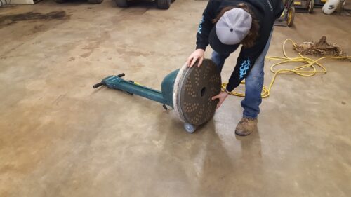Remove scratches from concrete floor