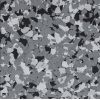 B-616 (Wombat) 1/4″ Epoxy Flakes | Black, Grey& White Chips | Concrete Floor Supply